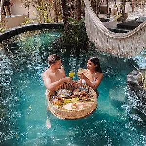 the-yellow-nest-tulum.allrivieramayahotels.com/